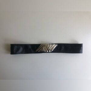 Adjustable black genuine leather belt (31” max.)